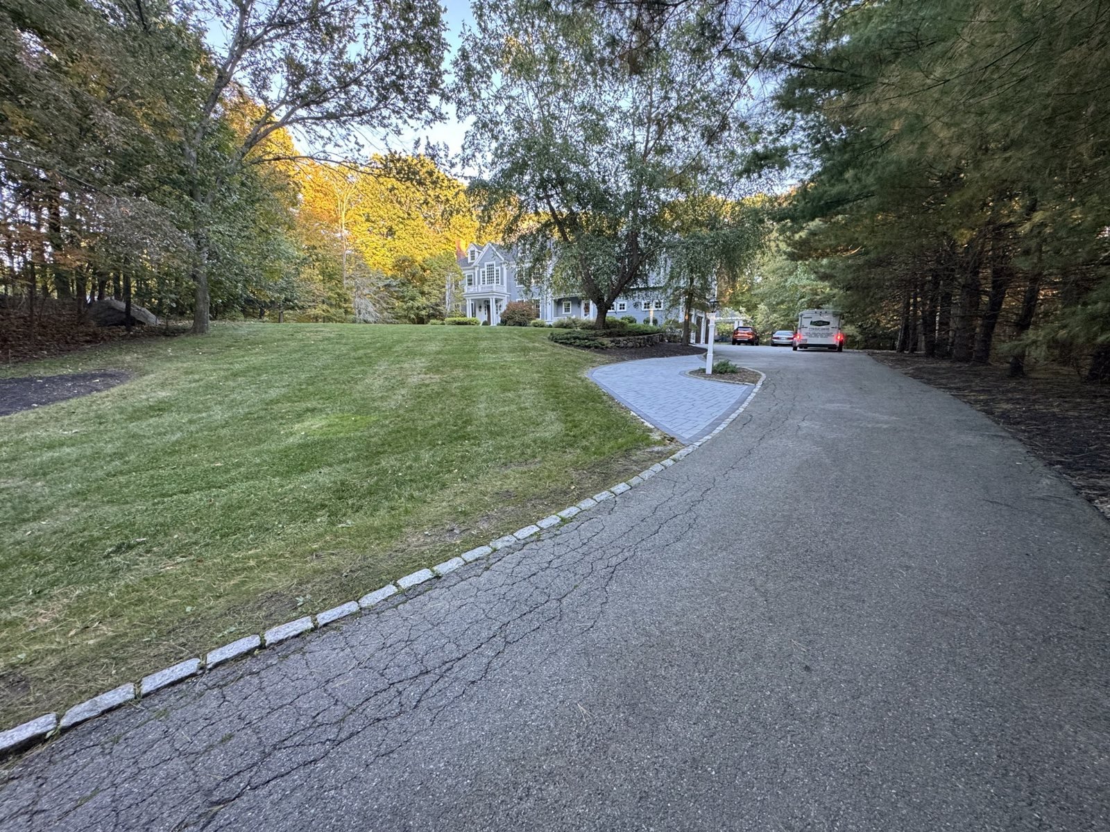 Long driveway lawn, edged and cut